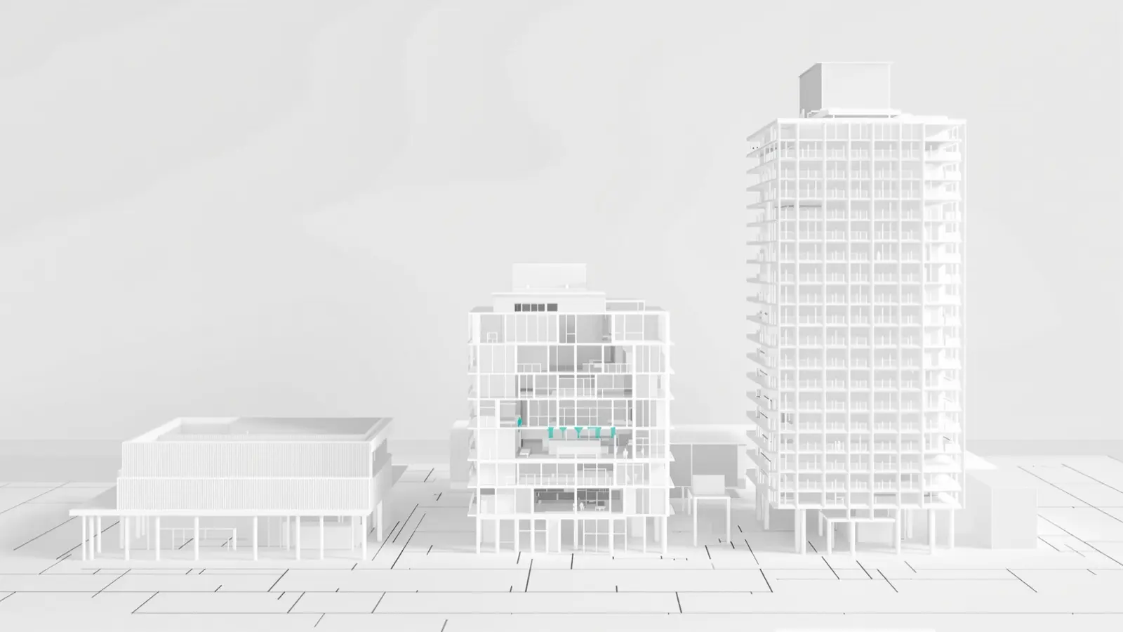 Tres maquetas blancas de edificios de salud, cada una más alta y compleja que la anterior, del pabellón de consulta a la torre de alta especialidad